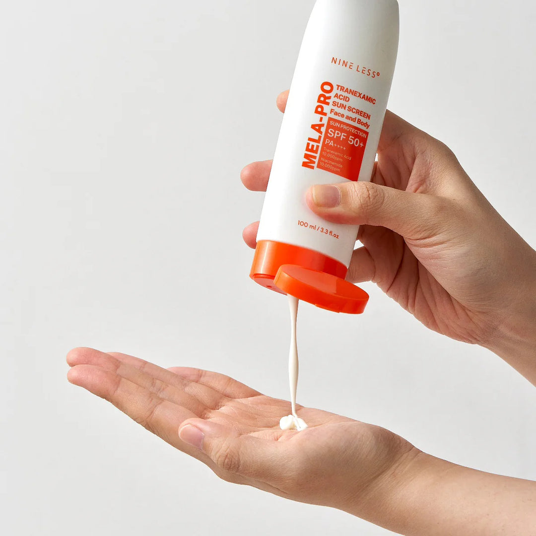 NINE LESS mela pro tranexamic acid sunscreen face and body sun protection spf 50 + pa +++ واقي الشمس بالترانزاميك اسد من ناين ليس