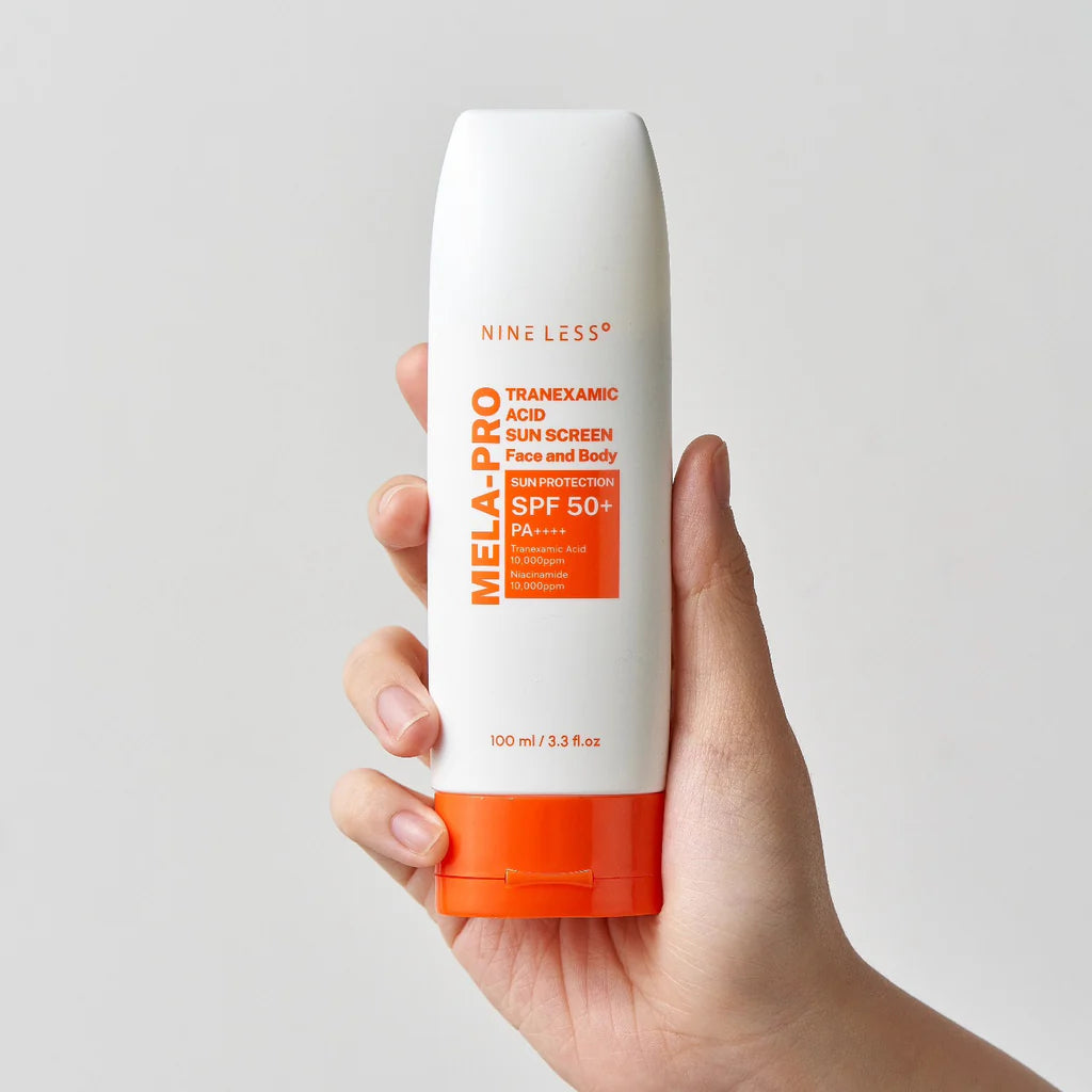 NINE LESS mela pro tranexamic acid sunscreen face and body sun protection spf 50 + pa +++ واقي الشمس بالترانزاميك اسد من ناين ليس